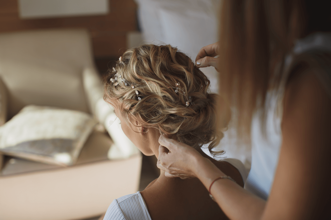 a woman with a wedding stylist in cabo